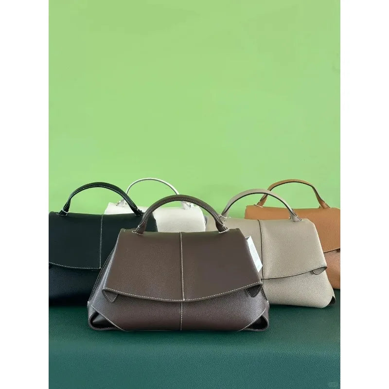 1pcs High end luxury leather smile bag with pleated design, single shoulder large capacity commuting handbag